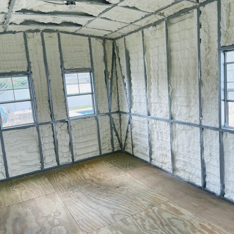 Closed-cell spray foam insulation applied to wall cavities in a residential project in Port Orchard